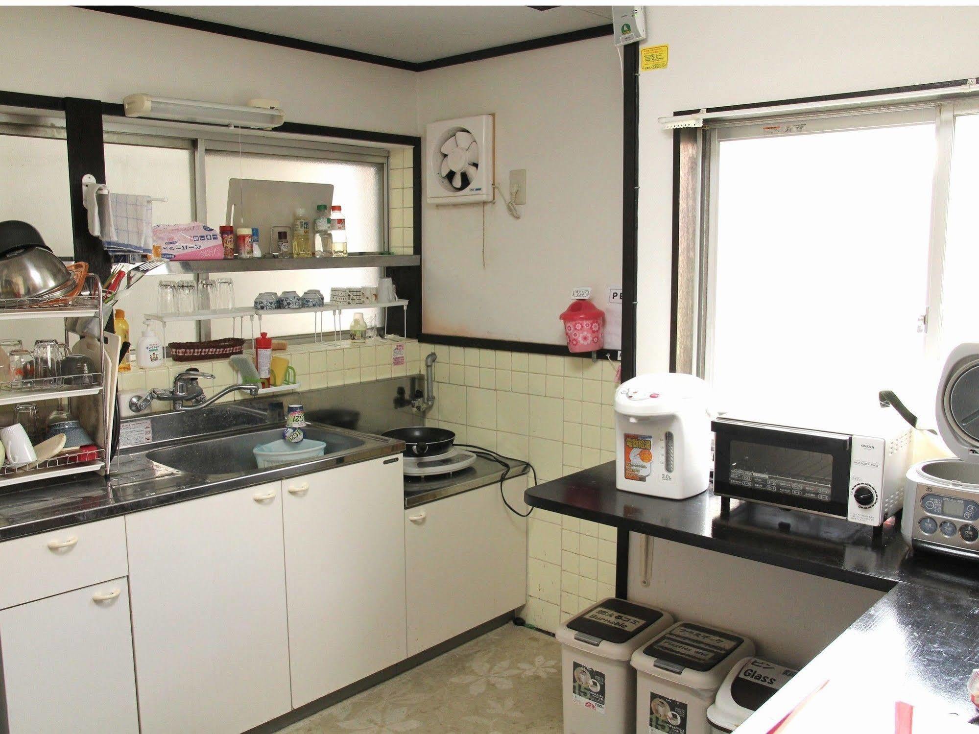 Guest House Carpe Hiroshima Koi Екстер'єр фото